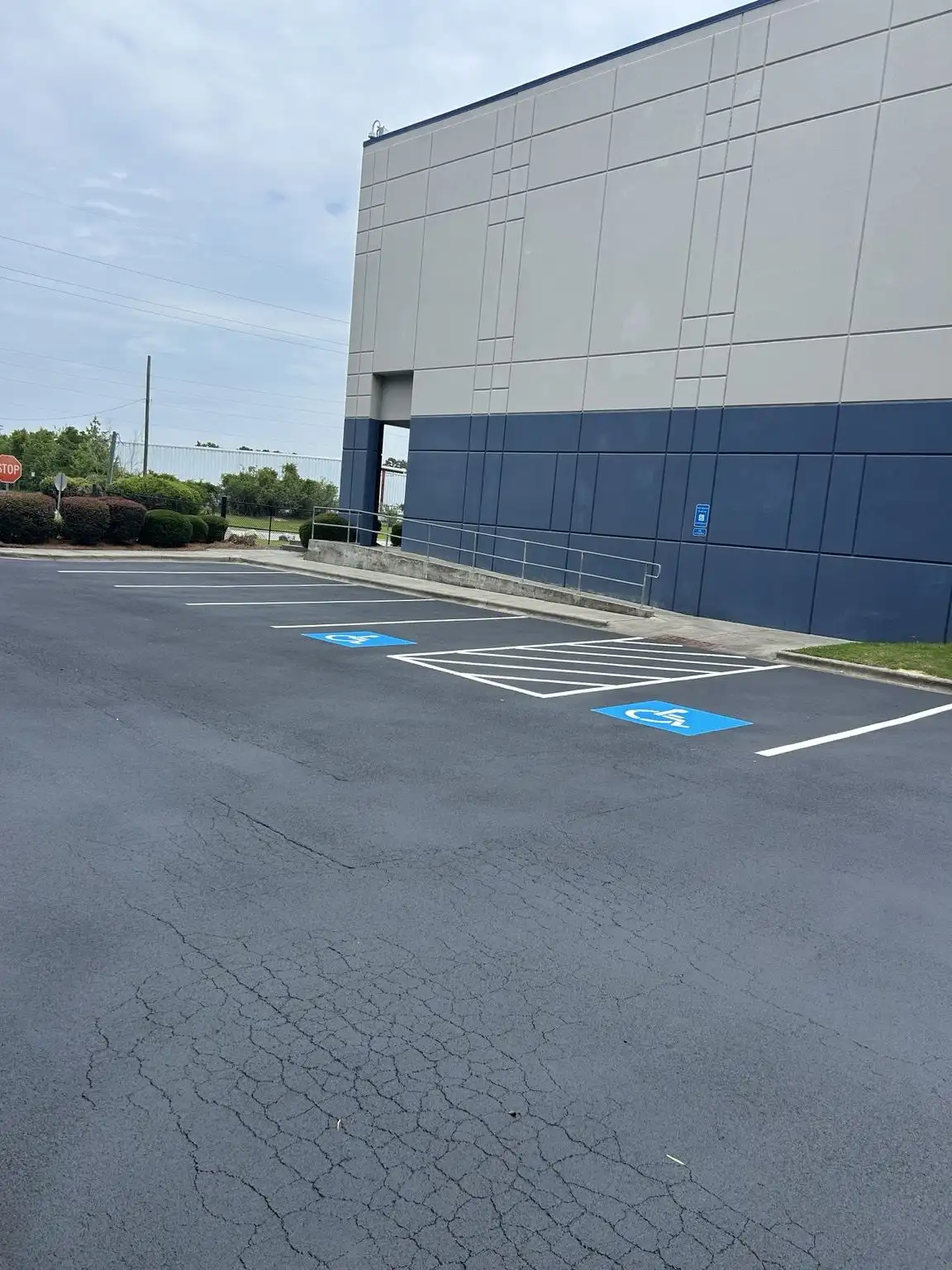 ADA parking spaces and striping at a large commercial warehouse