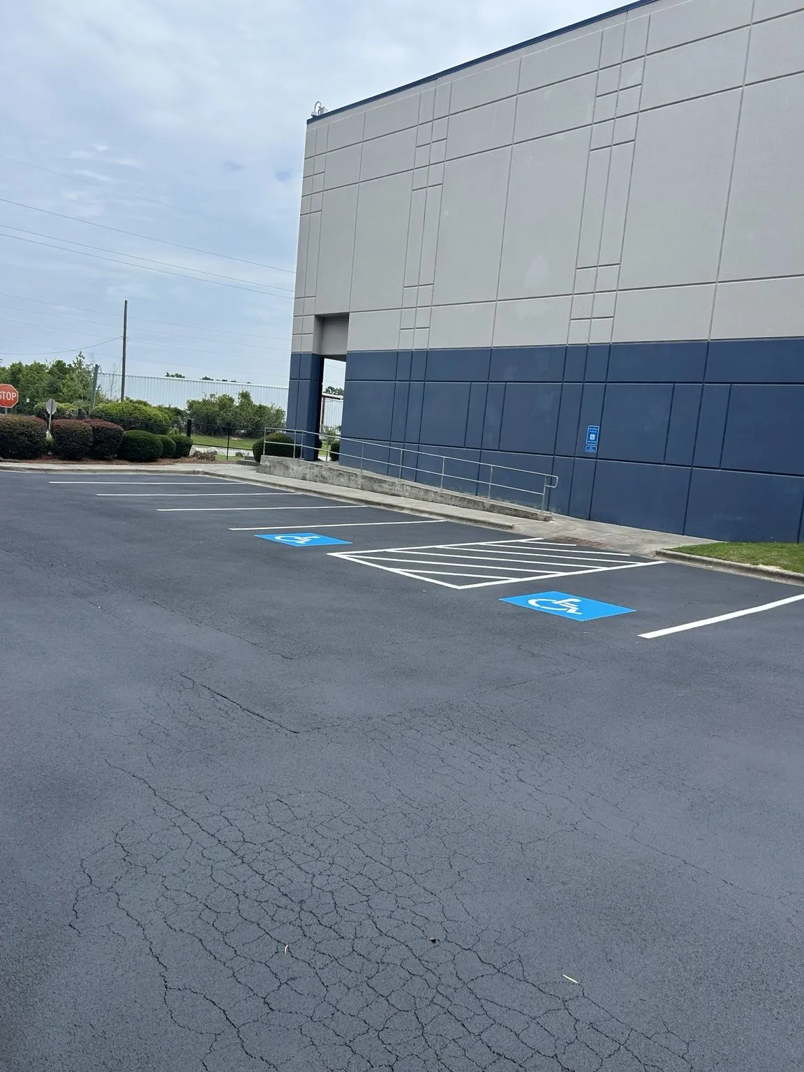 ADA parking spaces and striping at a large commercial warehouse